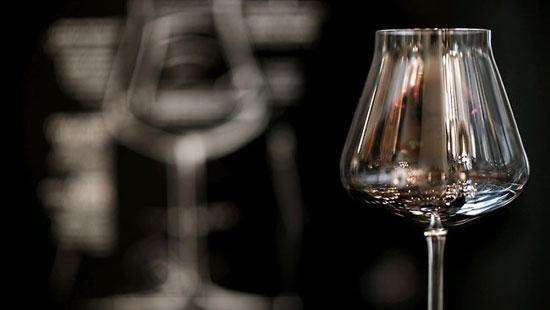 A French company has designed a new glass whose unique shape they say keeps the alcohol from masking the delicate notes of a fine wine. [File photo]
