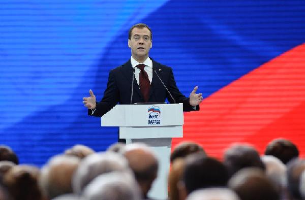 Medvedev succeeds Putin as ruling party leader