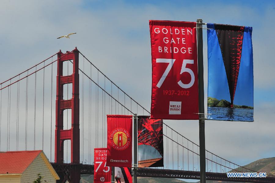 Celebration banners are seen near the Golden Gate Bridge during its 75th anniversary celebration, San Francisco, the United States, May 27, 2012. Tens of thousand of people came to mark the 75th anniversary of the Golden Gate Bridge, which was opened in 1937. (Xinhua/Liu Yilin)