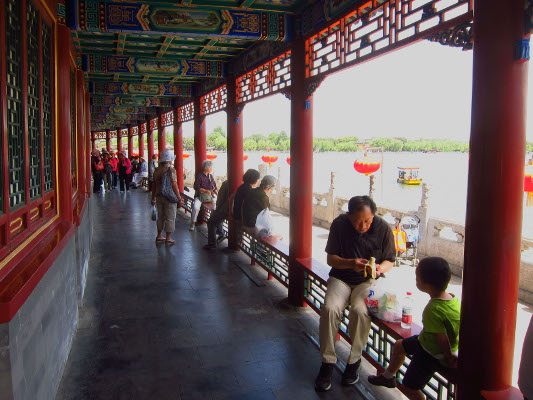Relaxing on the lake's perimeter in Beihai Park.
