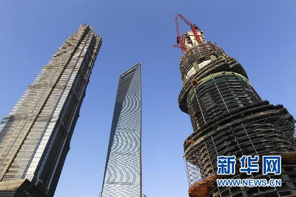 The 'Shanghai Tower,' which is currently under construction in the eastern metropolis of Shanghai and will stand as China's tallest building upon completion, reached 303.5 meters in height on Tuesday. [ Photo / Xinhua ] 