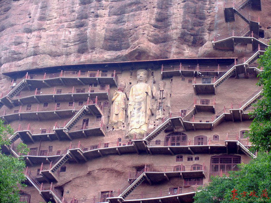 These grottoes (麦积山石窟) are found on the precipices of Maiji Mountain 30 kilometers south of Tianshui County, Gansu Province. Maiji Mountain is a green and graceful peak in the western part of the grand Qinling Range. The grottoes were cut during a period of 1,500 years, from the Later Qin Dynasty (384-417) until the Qing Dynasty (1644-1911). 