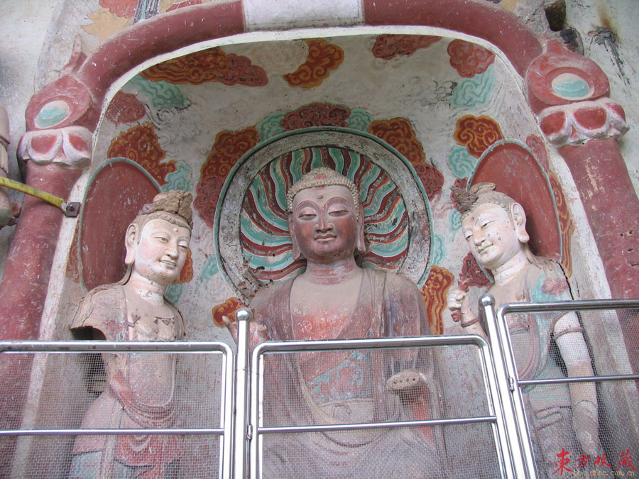 These grottoes (麦积山石窟) are found on the precipices of Maiji Mountain 30 kilometers south of Tianshui County, Gansu Province. Maiji Mountain is a green and graceful peak in the western part of the grand Qinling Range. The grottoes were cut during a period of 1,500 years, from the Later Qin Dynasty (384-417) until the Qing Dynasty (1644-1911). 