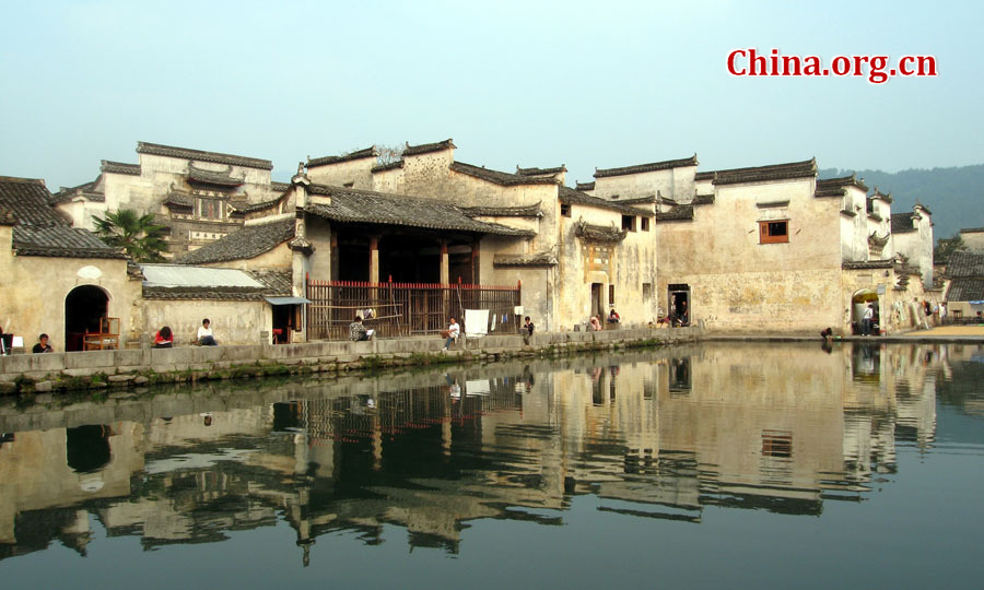 Hongcun Village is located in Yixian County at the foot of the southwestern slope of Huangshan Mountain, Anhui Province. With morning mist, stone bridges, white walls, water lily ponds and hills, it has been described as a village out of a traditional Chinese ink painting.