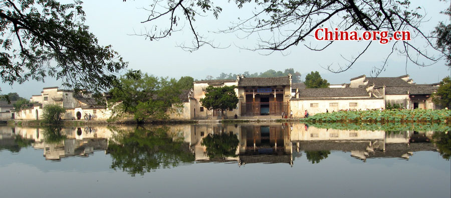 Hongcun Village is located in Yixian County at the foot of the southwestern slope of Huangshan Mountain, Anhui Province. With morning mist, stone bridges, white walls, water lily ponds and hills, it has been described as a village out of a traditional Chinese ink painting.