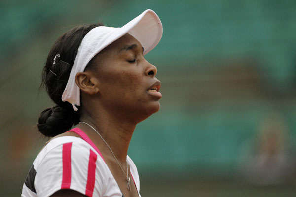 Venus refuses to mope after second round 
