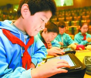 This generation of students have grown up with new media, including the Internet, computers and cell phones. [File photo]