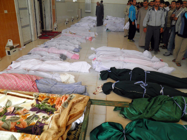 A handout picture released by the Syrian opposition's Shaam News Network shows the bodies of 108 people including 32 children before their burial in the central Syrian town of Houla on May 26, 2012. [Xinhua]