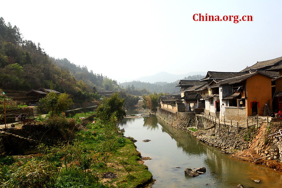 Built on a base of stone, the thick walls of Tulou were packed with dirt and fortified with wood or bamboo internally. The architectural arts of the Fujian Tulou can be traced back nearly 1,000 years, and their design incorporates the tradition of fengshui (favorable siting within the environment).