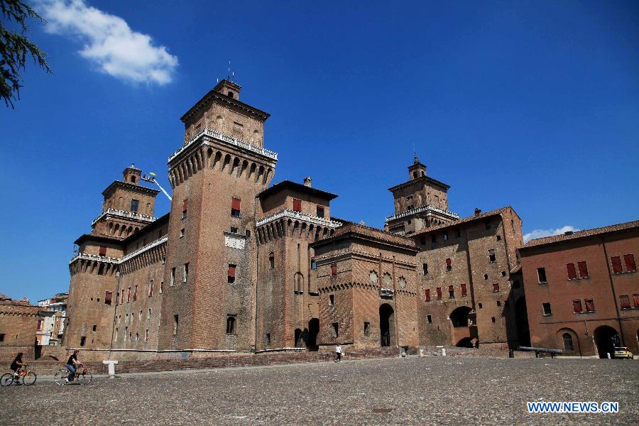 Working staff check the turret of Castello Estense as less visitors seen in the historical city of Ferrara, 68 kilometers northeast to the epicenter of the earthquake in northern Italy, on May 30, 2012.