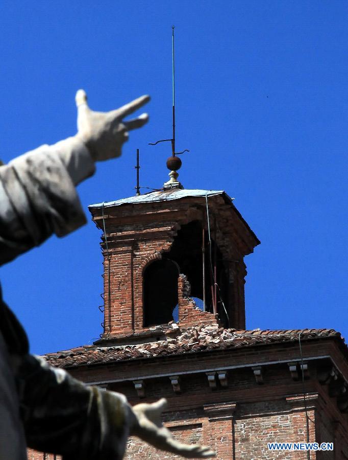 A turret of Castello Estense is seen damaged in the historical city of Ferrara, 68 kilometers northeast to the epicenter of the earthquake in northern Italy, on May 30, 2012. 