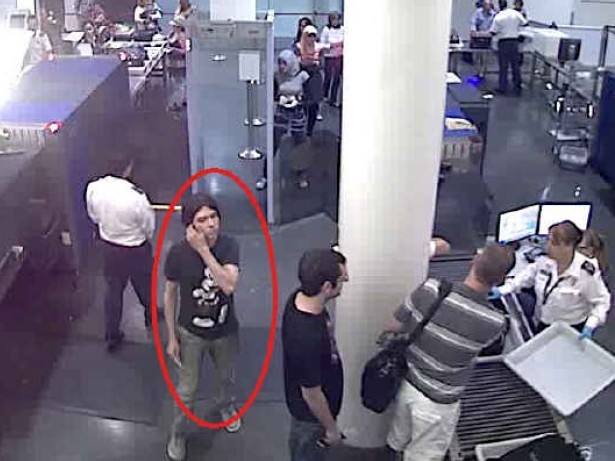 Interpol released pictures reportedly showing suspect Luka Magnotta passing through security at an airport. [Interpol]