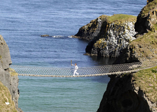 Olympic torch spotlights Northern Ireland coast