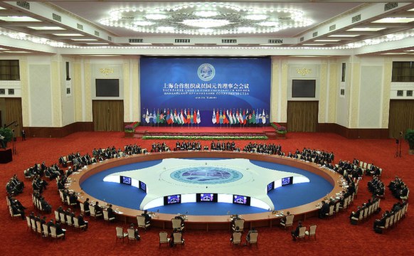 The large group meeting of the Shanghai Cooperation Organization(SCO) Beijing summit convened Thursday at the Great Hall of the People, downtown Beijing. 