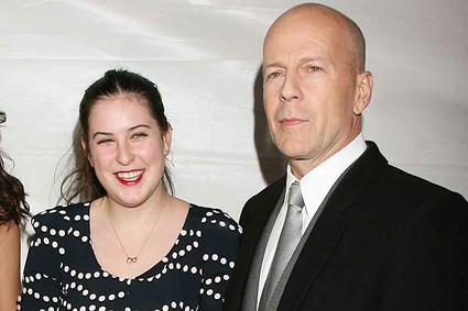 Actor Bruce Willis,and his daughter Scout Willis arrive at the world premiere of their film Cop Out, Monday, Feb. 22, 2010 in New York. [Agencies]