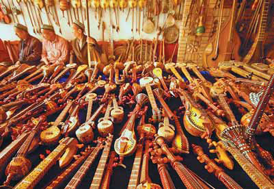 Uygur musical instruments are hot commodities at local markets. Yuan Peide / for China Daily