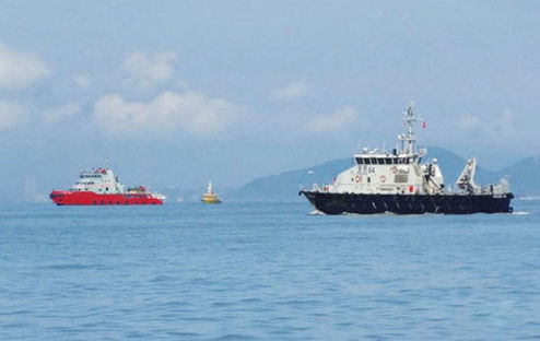 China sent a marine surveillance ship in April to Huangyan Island to ensure the security of Chinese fishermen and their vessels. [Xinhua]
