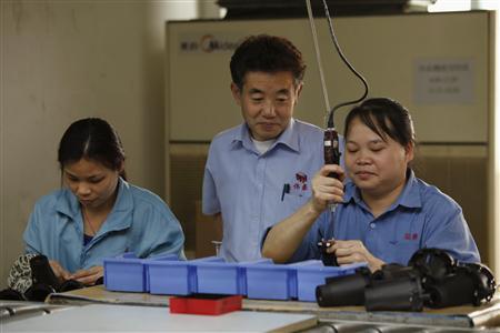 In recent years, the city of Dongguan has been working to improve manufacturing technology, to enhance competitiveness. To help move things forward, some skilled workers from Japan have been drafted in. [File photo]