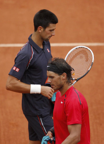 Nadal and Djokovic must return to finish Paris duel