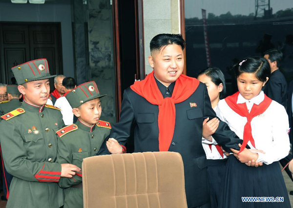 Photo released by Korean Central News Agency on June 6, 2012 shows Kim Jong Un attending a national event to celebrate the 66th anniversary of the founding of the Korean Children's Union in Pyongyang. Kim made a speech here encouraging schoolchildren to study hard for a promising DPRK and to carry forward the revolutionary tradition.