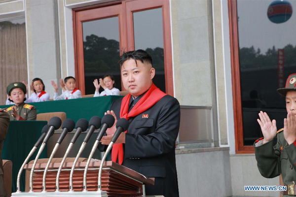 Photo released by Korean Central News Agency on June 6, 2012 shows Kim Jong Un attending a national event to celebrate the 66th anniversary of the founding of the Korean Children's Union at the Kim Il Sung Stadium in Pyongyang. Kim made a speech here encouraging schoolchildren to study hard for a promising DPRK and to carry forward the revolutionary tradition.