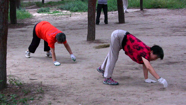 Women explore their feral side at the Temple of Heaven Park.