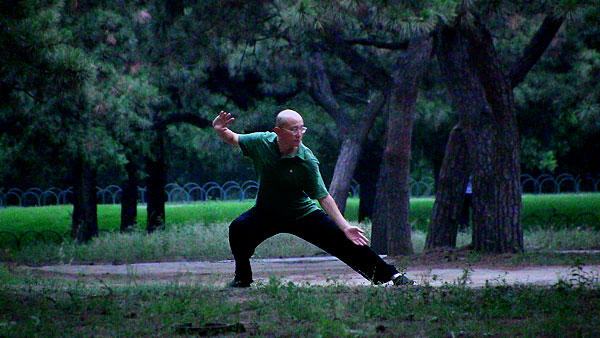 Tai chi at dusk at the Temple of Heaven Park.