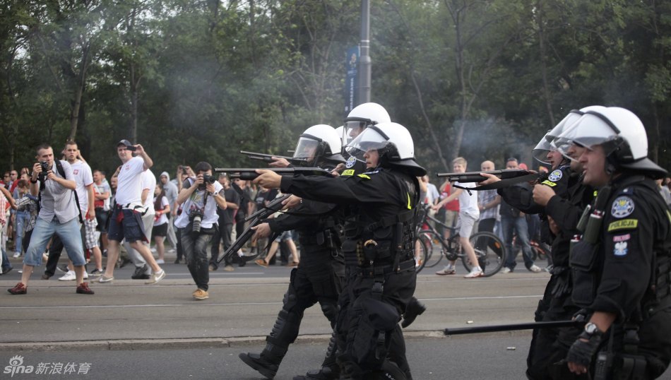 Police try and re-gain control as violence breaks out.