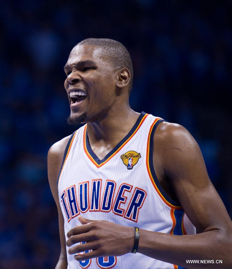 Oklahoma City Thunder's Kevin Durant reacts during Game 1 of the NBA basketball finals against Miami Heat in Oklahoma City, the United States, June 12, 2012. Thunder won 105-94. (Xinhua/Yang Lei) 
