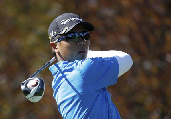 Golf-Teenager Zhang relishes Tiger time at US Open