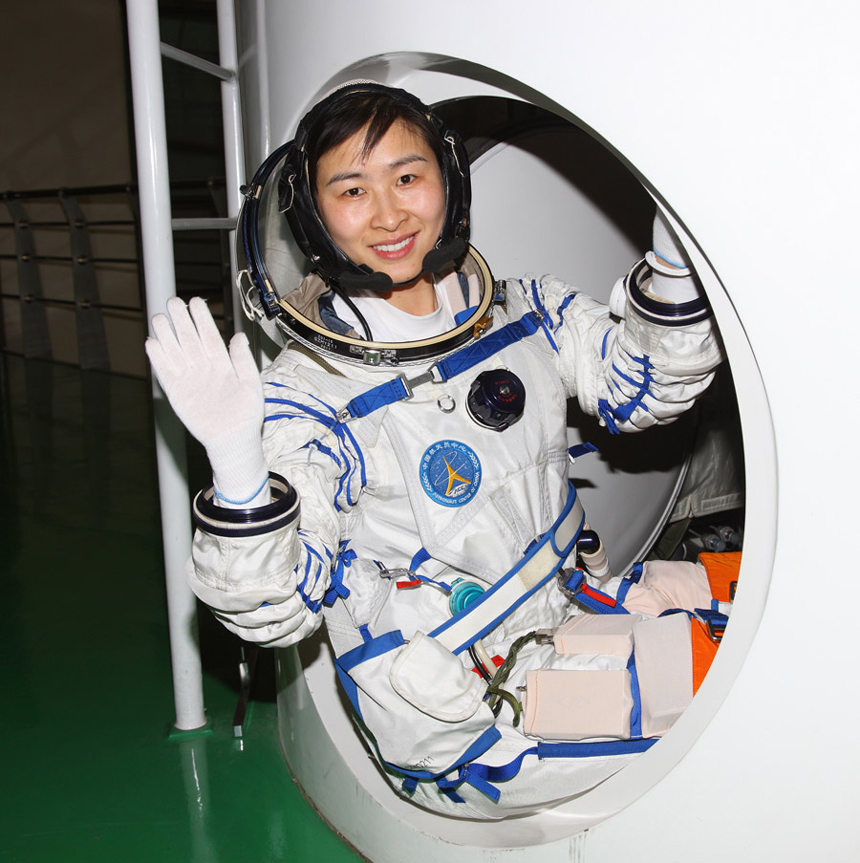  Three astronauts, two male and one female, will board Shenzhou 9 spacecraft to fulfill China's first manned space docking mission. In the picture is Liu Yang.