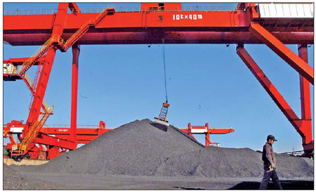 Coal is ready for transportation in a coal yard in Qinhuangdao, Hebei province. 