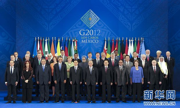 Leaders of the Group of Twenty (G20) pose for a photo in Los Cabos, Mexico, June 18, 2012. 