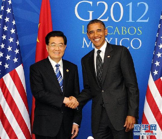 Chinese President Hu Jintao(L) met his U.S. counterpart Barack Obama(R)Tuesday in Los Cabos, Mexico, June 19, 2012. [Xinhua] 
