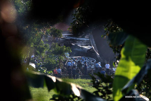 Wreckage of Indonesian Air Force plane Foker 27 is seen at the air force compound in Jakarta, Indonesia, on June 21, 2012. Indonesian Air Force plane Focker 27 crashed at the air force compound in Jakarta on Thursday, killing at least 9 people, Iskandar Sitompul, military spokesman said here. [Photo: Xinhua]