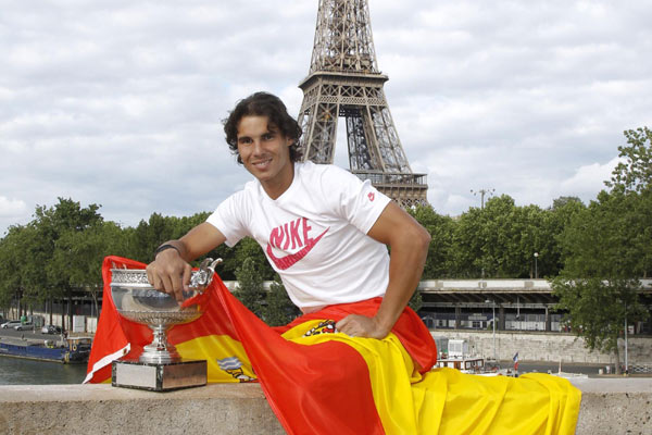 Nadal honored to carry flag for Spain