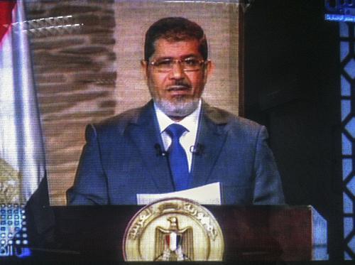 Egypt's new president Mohamed Morsi delivers a speech.[ Xinhua]