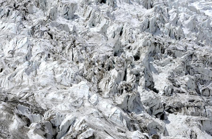 Photo taken on June 2, 2012 shows the Sabu glacier in Biru County, southwest China's Tibet Autonomous Region. The northern parts of the autonomous region have one of China's richiest glacier distributions, which are increasingly under the threat of global warming. (Xinhua/Chogo)