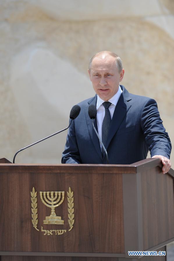 Russian President Vladimir Putin makes a speech during visiting &apos;Victory Monument&apos; in Netanya, north Israel, on June 25, 2012. Russian President Vladimir Putin began visiting Israel Monday. Before his travelling to Jerusalem to meet Israeli politicians, he stoped in Israeli coastal city Netanya to visit a monument honoring the soldiers of the old Soviet Union&apos;s red army that fought against Germany in World War II.