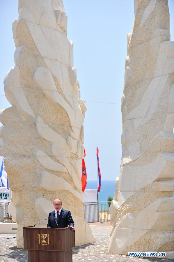 Russian President Vladimir Putin makes a speech during visiting &apos;Victory Monument&apos; in Netanya, north Israel, on June 25, 2012. 