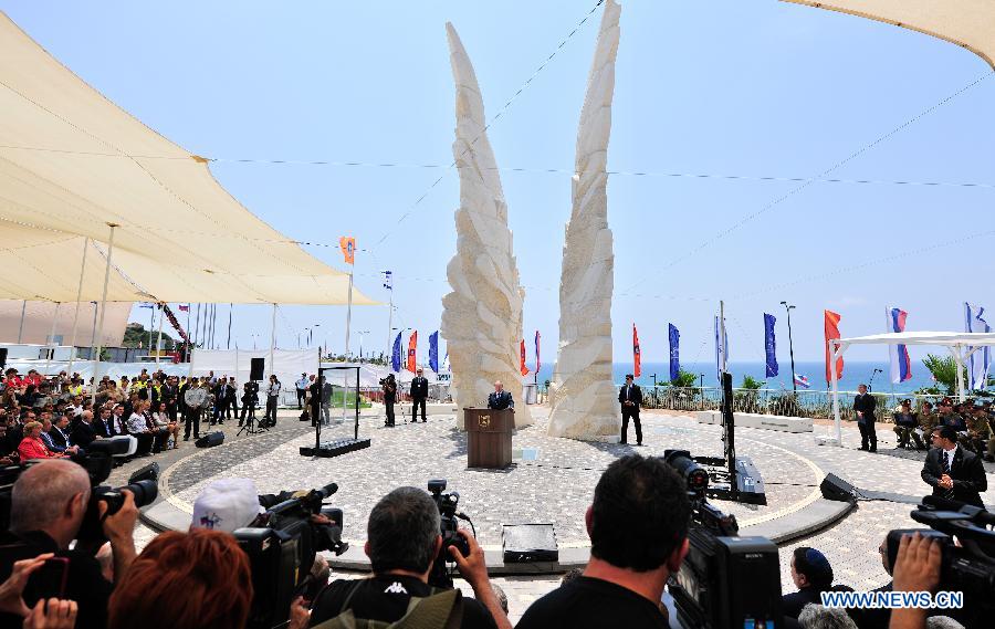 Russian President Vladimir Putin makes a speech during visiting 'Victory Monument' in Netanya, north Israel, on June 25, 2012. 