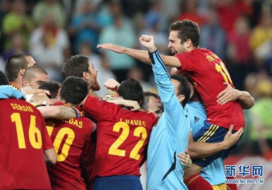 Spain struggles to beat Portugal 4-2 on penalties.