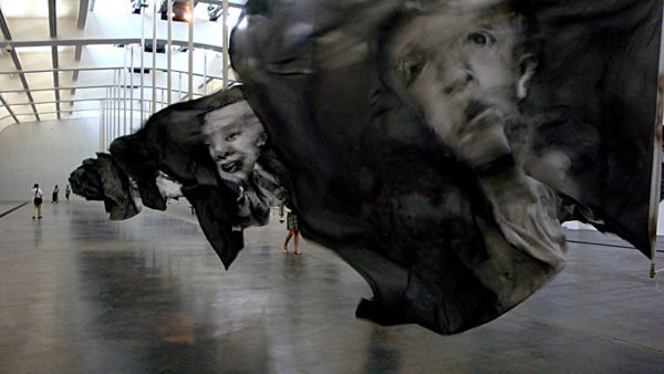 Portraits aflutter, drowning in a barrage of noise. Yan Pei Ming's Landscape of Childhood. [CRIENGLISH.com/William Wang]