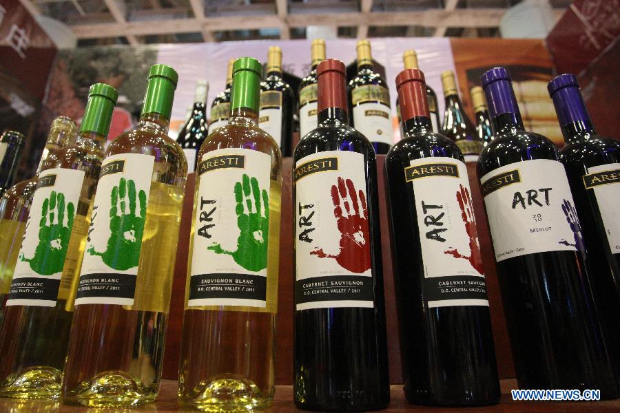 Photo taken on June 28, 2012 shows wine products displayed at an international wine expo in Yantai, east China&apos;s Shandong Province.