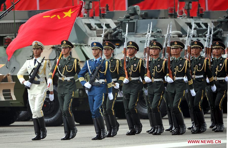 Soldiers of the Chinese People's Liberation Army (PLA) Garrison in the Hong Kong Special Administrative Region (HKSAR) are seen at the Shek Kong barracks in Hong Kong, south China, June 29, 2012. 