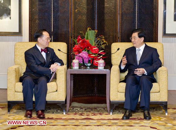 President Hu Jintao (R) meets with Chief Executive of the Hong Kong Special Administrative Region (HKSAR) Donald Tsang in Hong Kong, June 29, 2012. Hu is in Hong Kong to attend the celebrations marking the 15th anniversary of Hong Kong's return to the motherland and the swearing-in ceremony of the fourth-term government of the HKSAR.