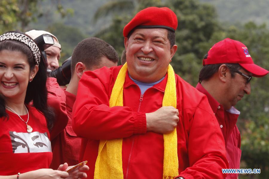 Venezuelan President Hugo Chavez heads the event that marks the beginning of his political campaign for Venezuela's presidential election in Mariara, in the municipality of Diego Ibarra, State of Carabobo, Venezuela, on July 1, 2012. Chavez and opposition candidate Henrique Capriles will compete in the presidencial election on October 7. (Xinhua/Juan Carlos Hernandez) 