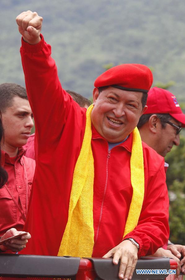 Venezuelan President Hugo Chavez heads the event that marks the beginning of his political campaign for Venezuela's presidential election in Mariara, in the municipality of Diego Ibarra, State of Carabobo, Venezuela, on July 1, 2012. Chavez and opposition candidate Henrique Capriles will compete in the presidencial election on October 7. (Xinhua/Juan Carlos Hernandez) 