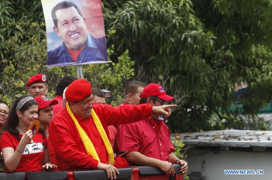 Venezuelan President Hugo Chavez heads the event that marks the beginning of his political campaign for Venezuela's presidential election in Mariara, in the municipality of Diego Ibarra, State of Carabobo, Venezuela, on July 1, 2012. Chavez and opposition candidate Henrique Capriles will compete in the presidencial election on October 7. (Xinhua/Juan Carlos Hernandez) 