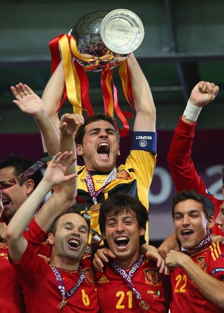 Captain Iker Casillas of Spain lifts the trophy after victory during the UEFA EURO 2012 final match between Spain and Italy at the Olympic Stadium on July 1, 2012. 